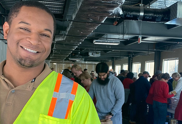 Smiling volunteer worker