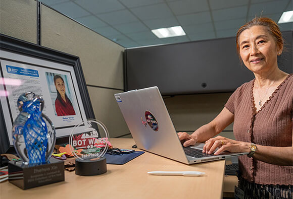 Dominion Energy Employee Working on Computer
