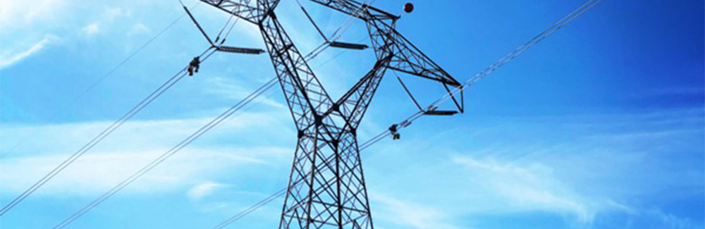 Power lines against a blue sky