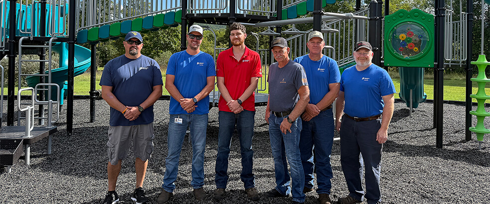 Dominion Energy Employees Working in Playground