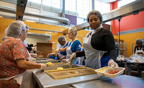 volunteers in kitchen