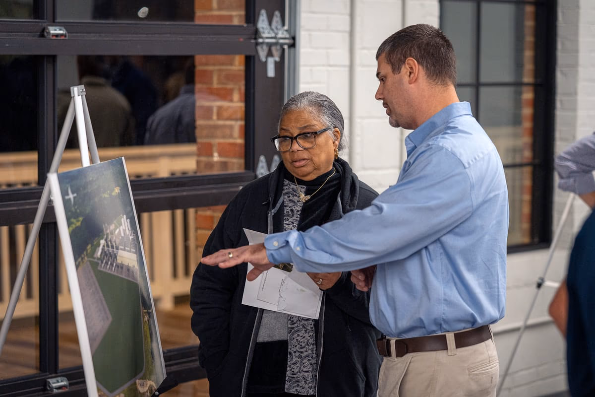 Dominion Energy Employee Talking to Customer