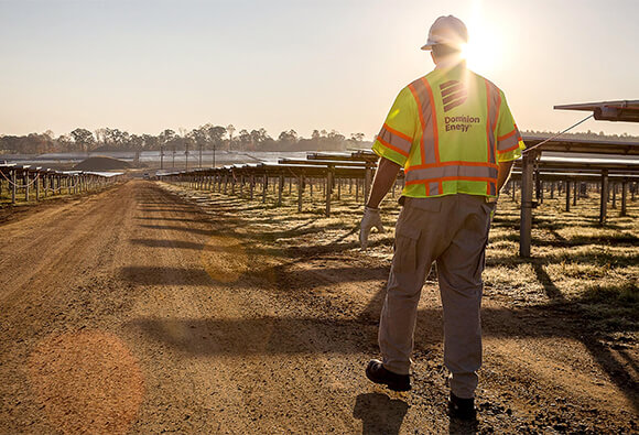 Dominion Energy Employee Walking Through Buckingham Solar Field