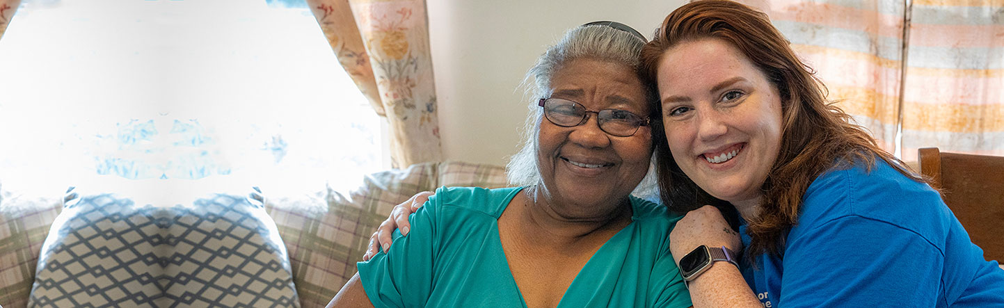 Two people smiling