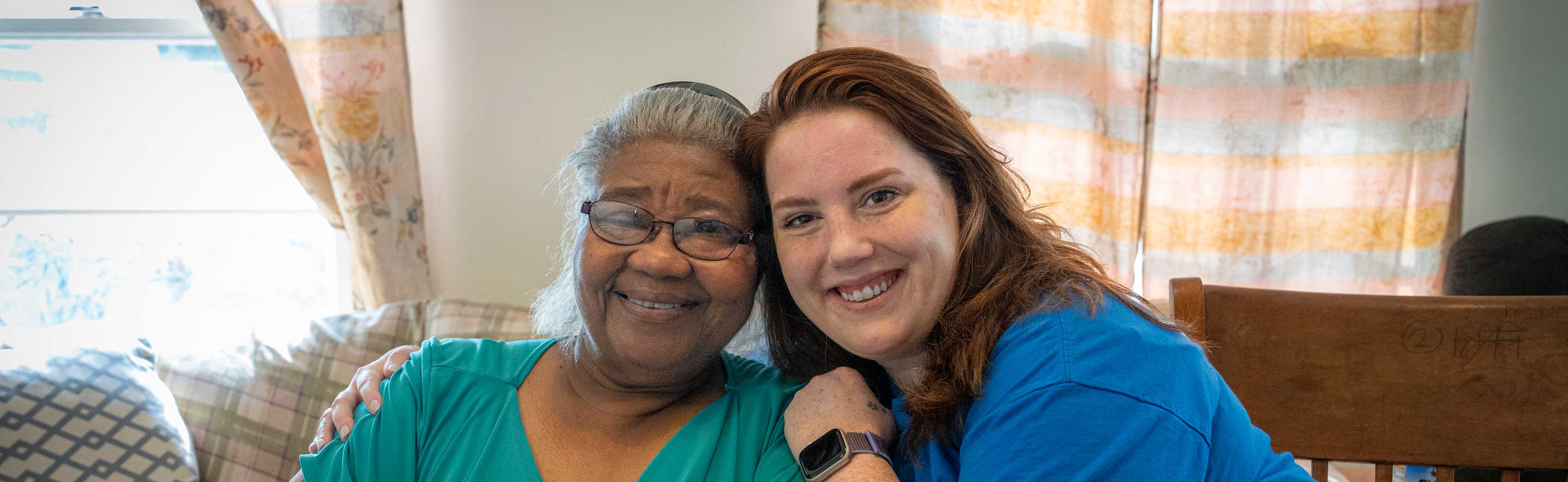 Two people smiling