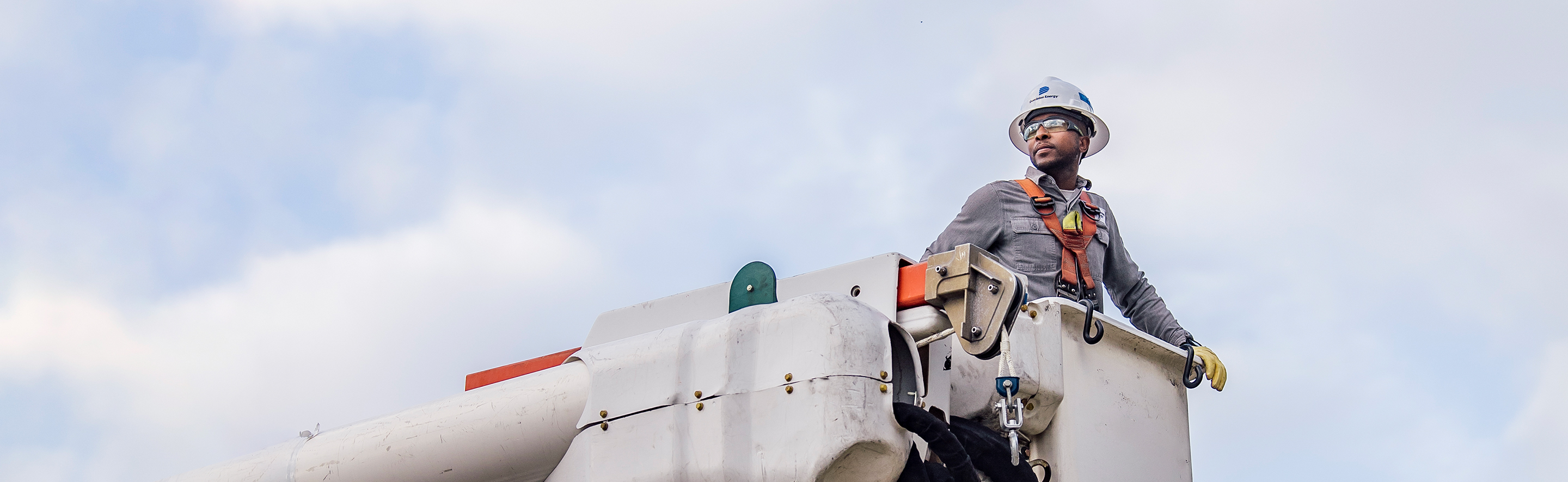 Lineworker in raised bucket