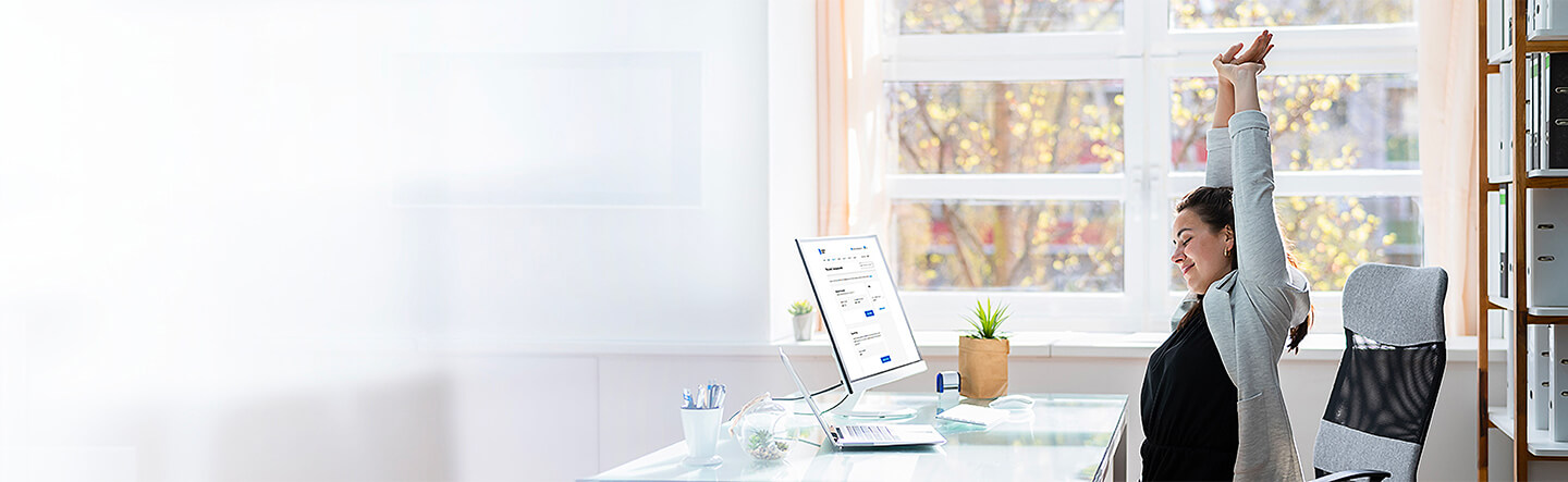 Lady Stretching Arms at Desk