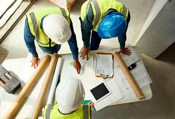 Contractors Reviewing Site Plans