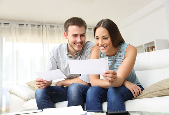 Couple Looking at Bill
