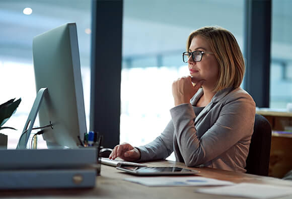 Business Executive on Computer