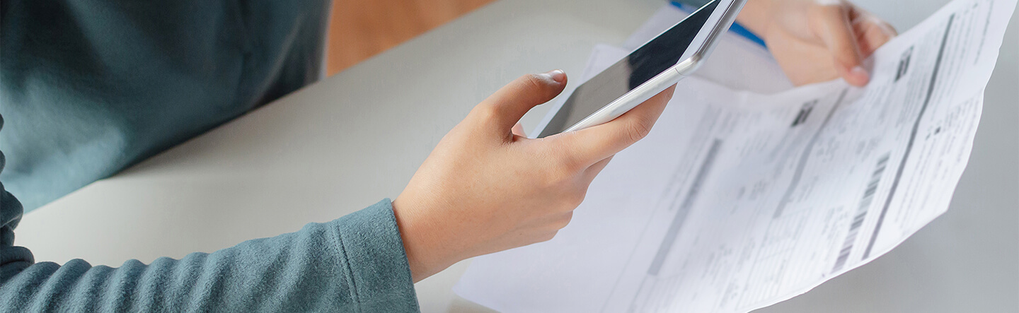 Using Phone to Scan QR Code on Paper Statement