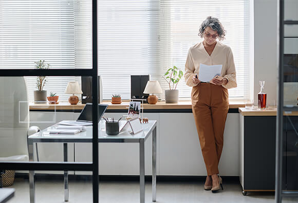 Financial Executive Studying Document