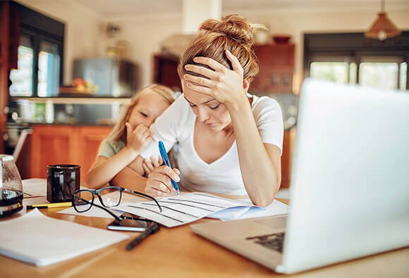 Mother Paying Bills