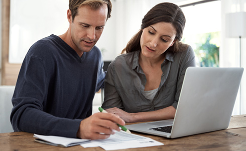 couple reviewing paperwork