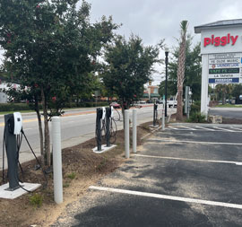 Charging stations along parking lot