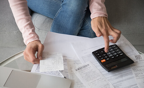 hand with calculator