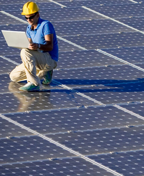 man on solar rooftop