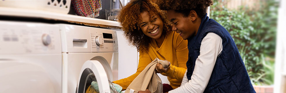 Mother and child with laundry