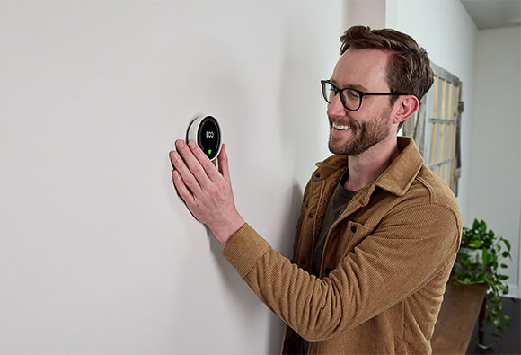 Frank Changing Temperature on Smart Thermostat