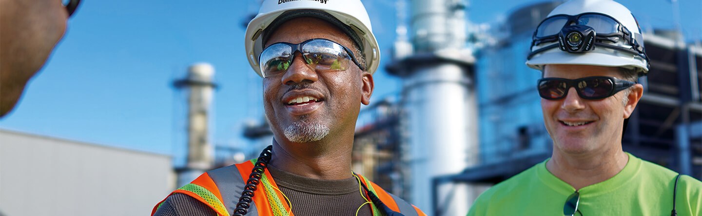 Dominion Energy Employees Standing in Front of Facility