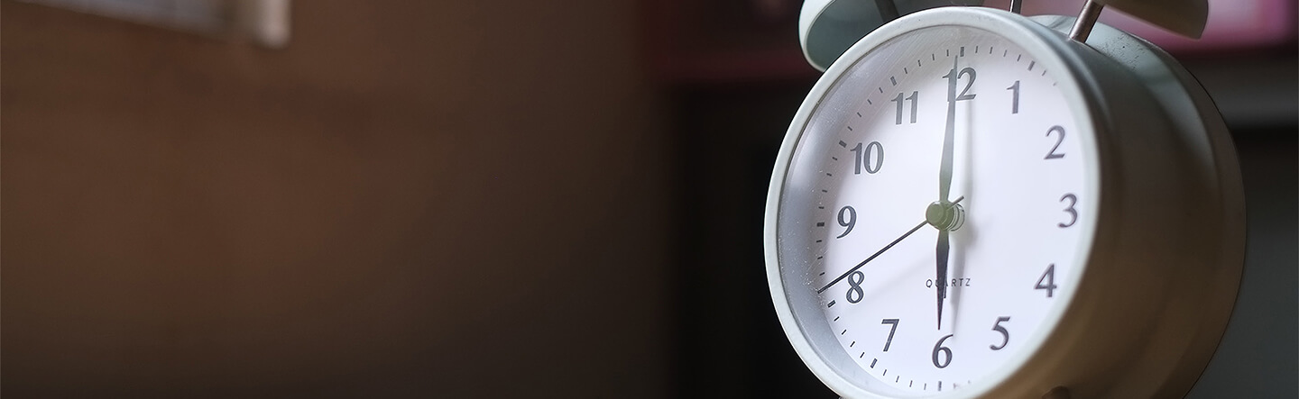 Clock Sitting on Desk