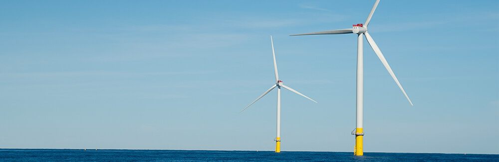 two offshore wind turbines