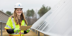 Employee near solar panels